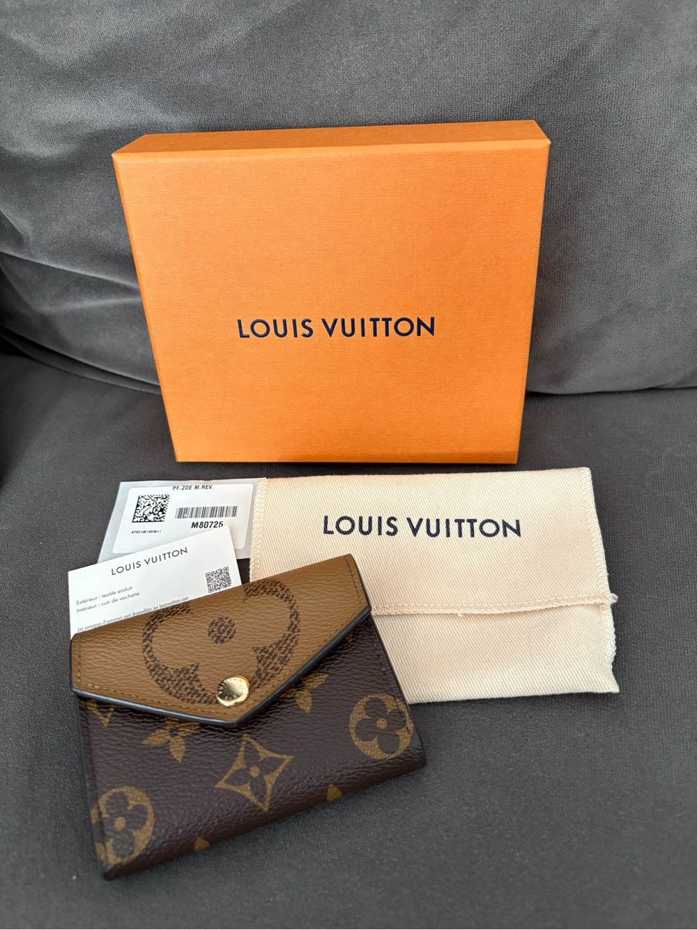 Authentic Louis Vuitton Zoe Wallet in Monogram